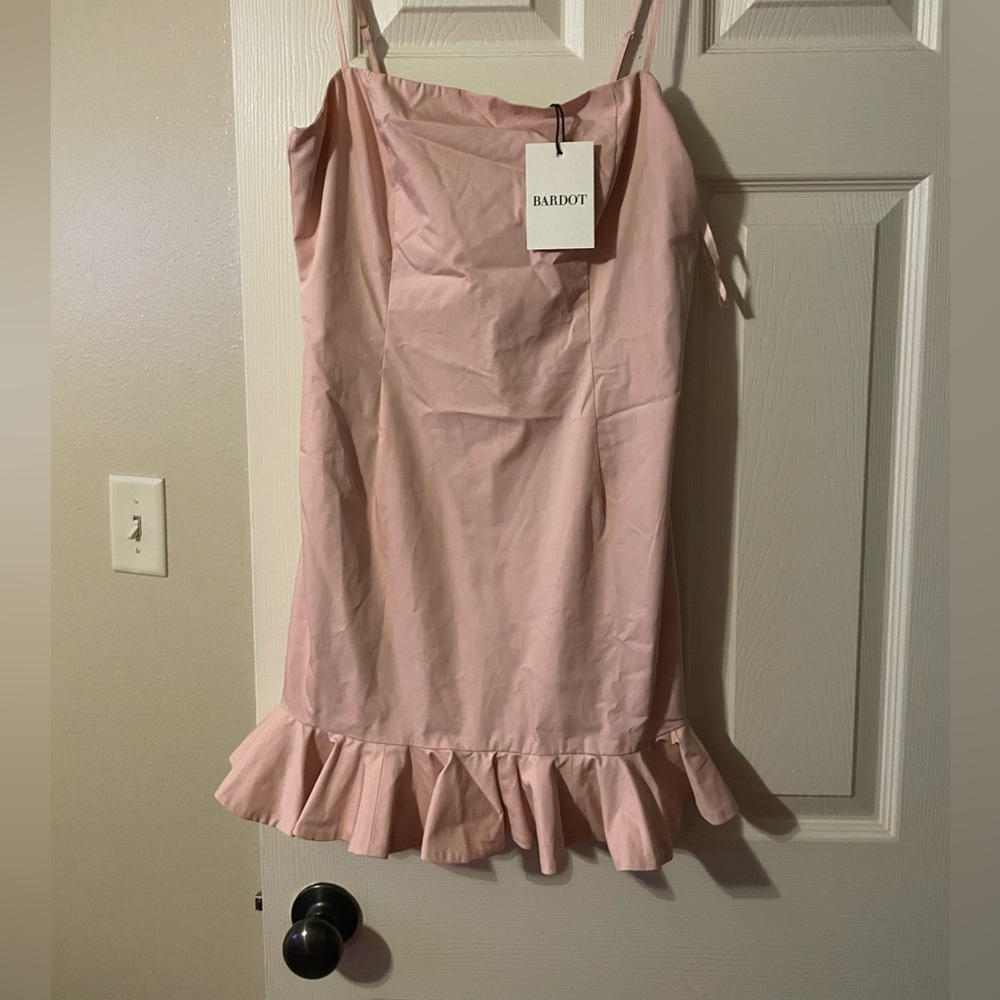 pink tight dress, could be formal or more casual.